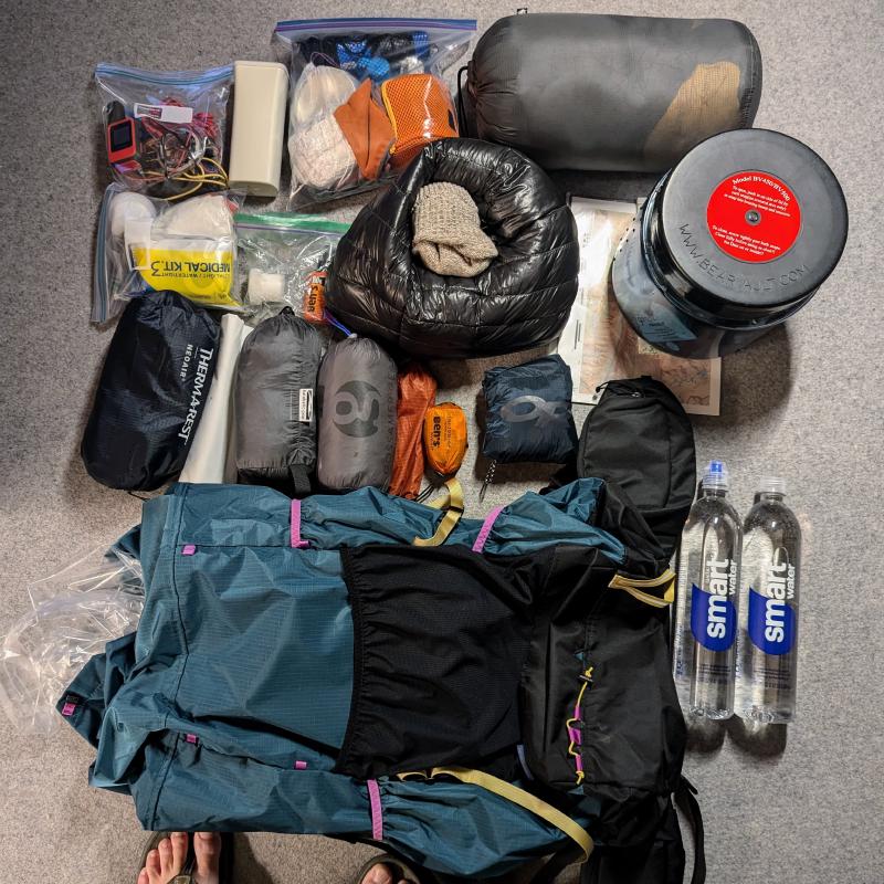 Gear for this trip arrayed on the floor. Upgrades include Gossamer Gear Mariposa 60 pack and Solo tarp, Enlightened Equipment Enigma quilt, and Katabatic Bristlecone Bivy.